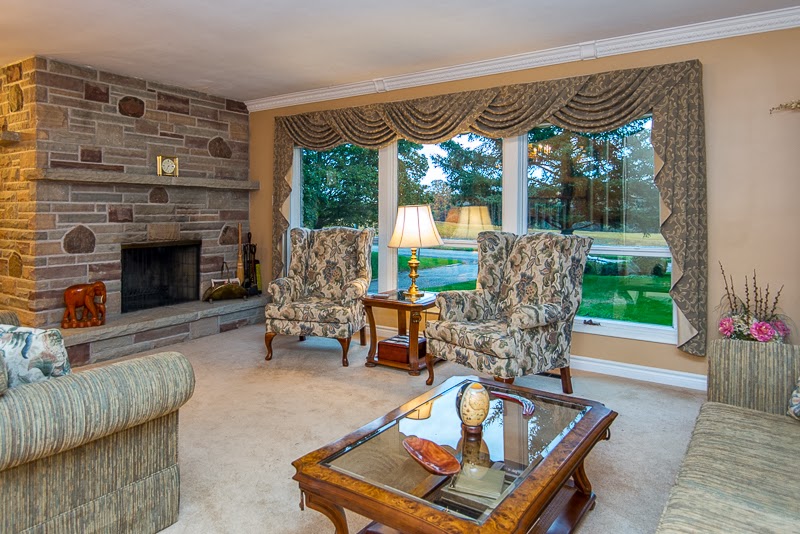 The Stuart Sinclair Team Timeless design amidst a picturesque backdrop!