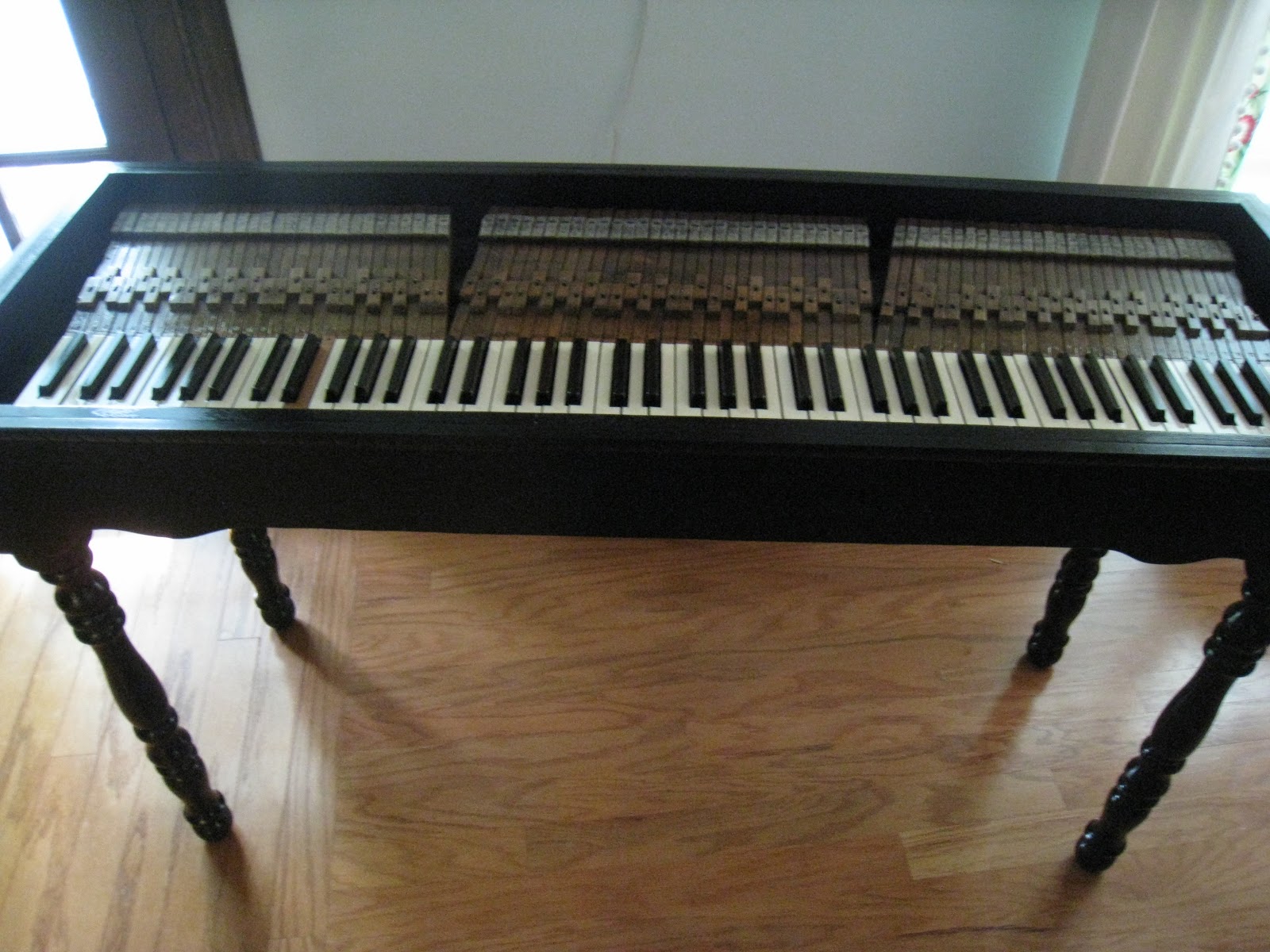 Repurposed For Life Piano keyboard made into a table
