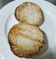 Toasted two halves of burger bun for veg burger recipe