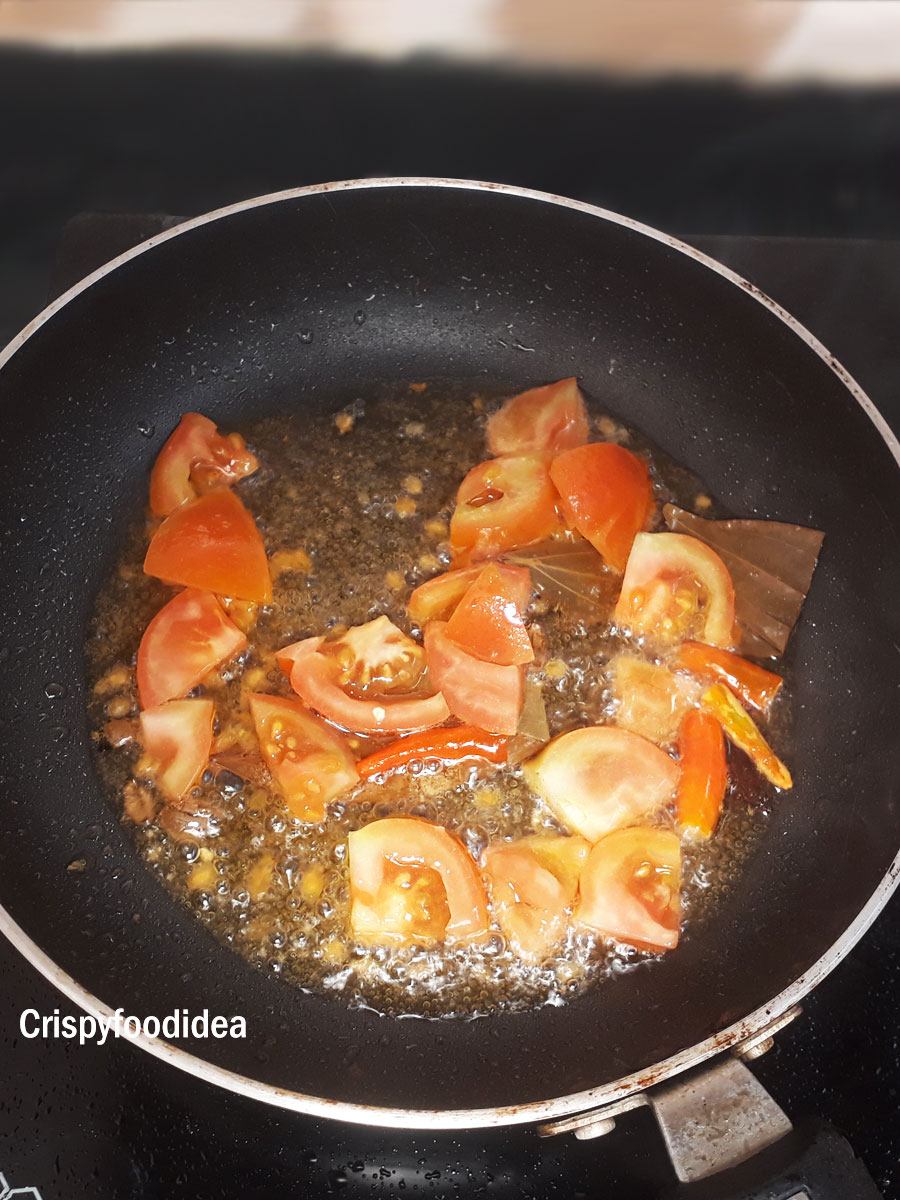 Add chopped tomatoes for Aloo Mutter
