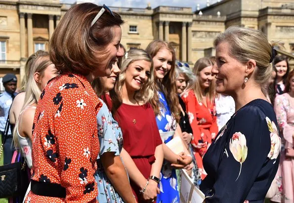 Princess Eugenie wore a silk dress by Peter Pilotto, the designer of her wedding dress. Countess of Wessex wore a floral print dress by Suzannah