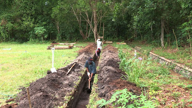 Trench digging for enclosure wall