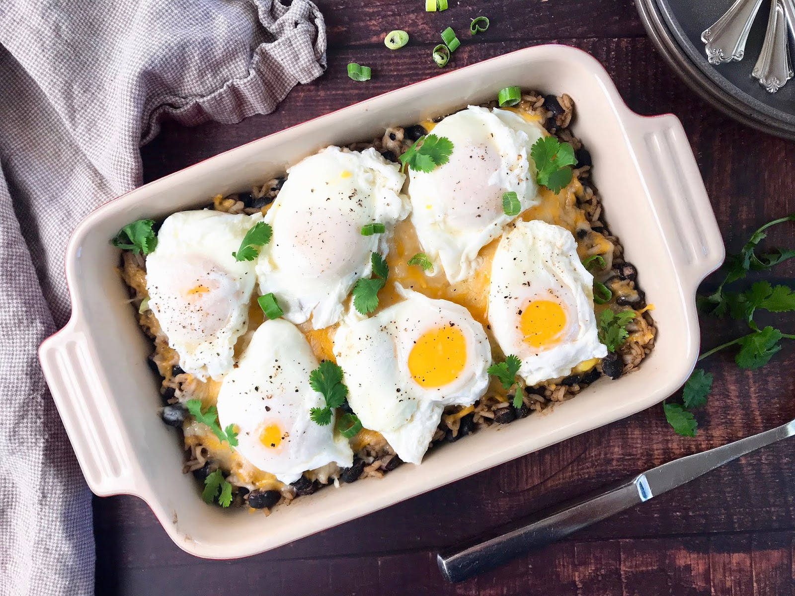 Cheesy Mexican Rice and Beans with Poached Eggs