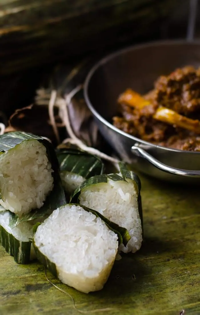 Glutinous rice cooked in banana leaves