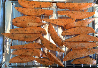sliced sweet potato on baking rack 