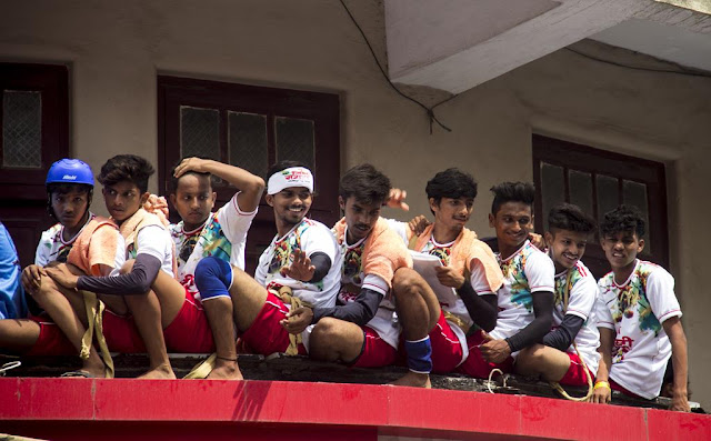 dahi handi, team, young boys, lads, teenageers, enjoying, dadar, mumbai, india, chawl, 