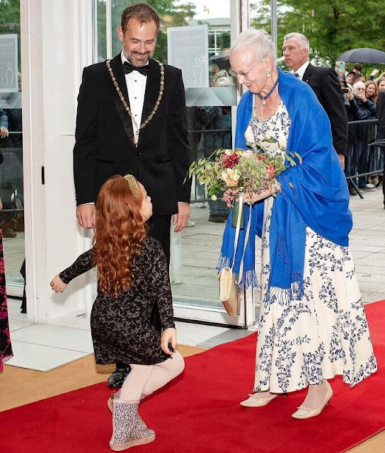 Aarhus Festival 2021 at Aarhus Concert Hall. Queen Margrethe wore a floral print dress gown. The Queen is patron of Aarhus Festival