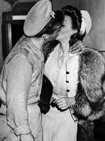 Carole Landis Kissing A Soldier