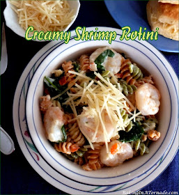 Creamy Shrimp Rotini, fresh shrimp and vegetables are mixed with pasta and served in a creamy sauce. | Recipe developed by www.BakingInATornado.com | #recipe #dinner