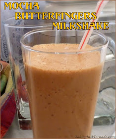 Mocha Butterfingers Milkshake, vanilla and mocha flavored ice cream is infused with butterfingers candy bits for a unique sweet treat. | Recipe developed by www.BakingInATornado.com | #recipe #sweet