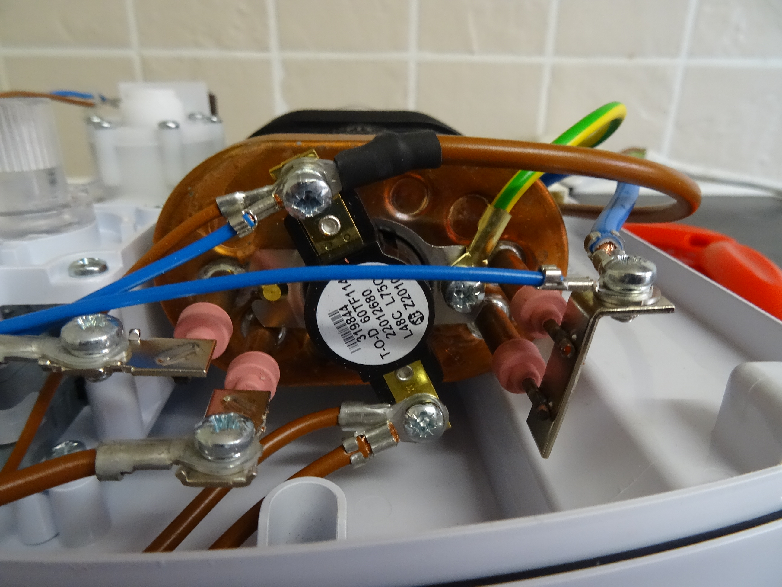Electrical shower fault finding and repair Electric shower thermal cut out testing and