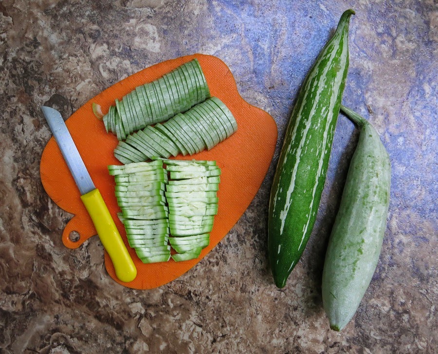 Sizzling Indian Recipes..... Snake gourd stir fry with Plums. [Stone