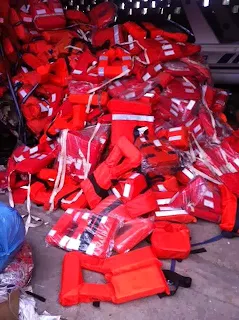 Life Jackets, Life Vests, used, second hand, reconditioned, balsa wood life jackets, cork life jackets, orange fabric, IRS, certified