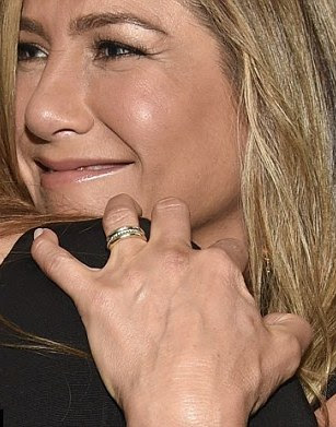 Jennifer Aniston is deliriously happy after secret wedding to Justin Theroux.