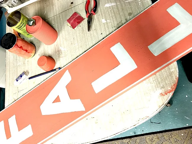 Mixing orange for a rustic vertical sign