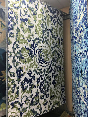 Muted blues and greens create stunning area rugs.