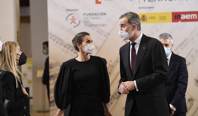 Queen Letizia wore a new black puff-sleeve taffeta knit top and trousers from Manuel Pertegaz