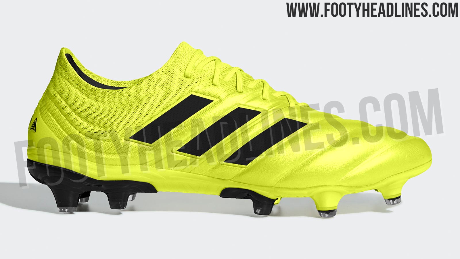 yellow and black adidas boots