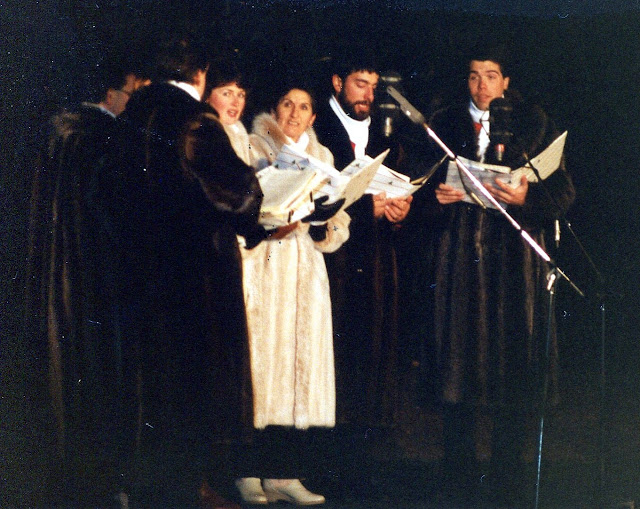 Denyse, centre, sings at the Parliament Hill tree lighting ceremony with the Stairwell Carollers - mid 1980's