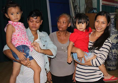 m Photo: Two children accidentally switched at birth three years ago return to their biological parents