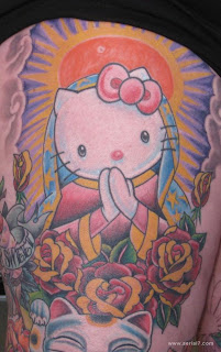 Hello Kitty religious Jesus christian weird tattoo