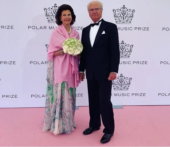 Princess Sofia wore a new silk floral maxi dress by Dolce & Gabbana, Crown Princess Victoria wore a new pink dress by Ida Sjostedt