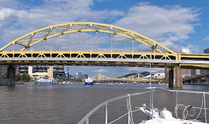 A gazillion boats outside the Pirates ballpark, just beyond Steelers Stadium. 700 bridges in Pbgh,