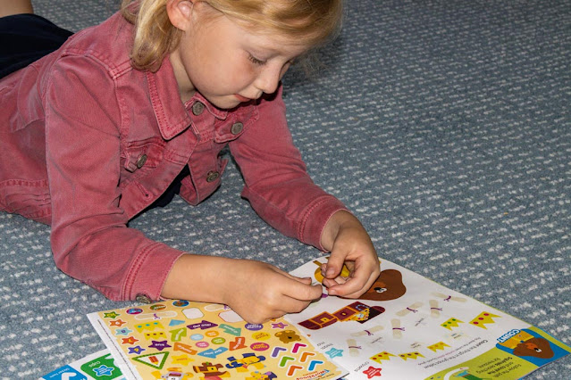 using hey duggee stickers Sticking a sticker on the hey duggee magazine