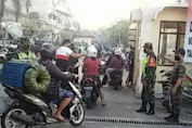 TNI-Polri Bersama Gugus Tugas Disiplinkan Masyarakat Terkait Protokol Kesehatan COVID-19.