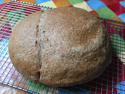 A rustic loaf with a shiny crust