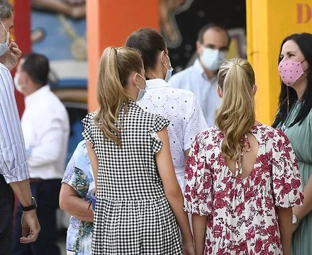 Queen Letizia wore a new floral laser-cut midi dress by Carolina Herrera. Princess Leonor wore a wide-fit printed dress by Sfera