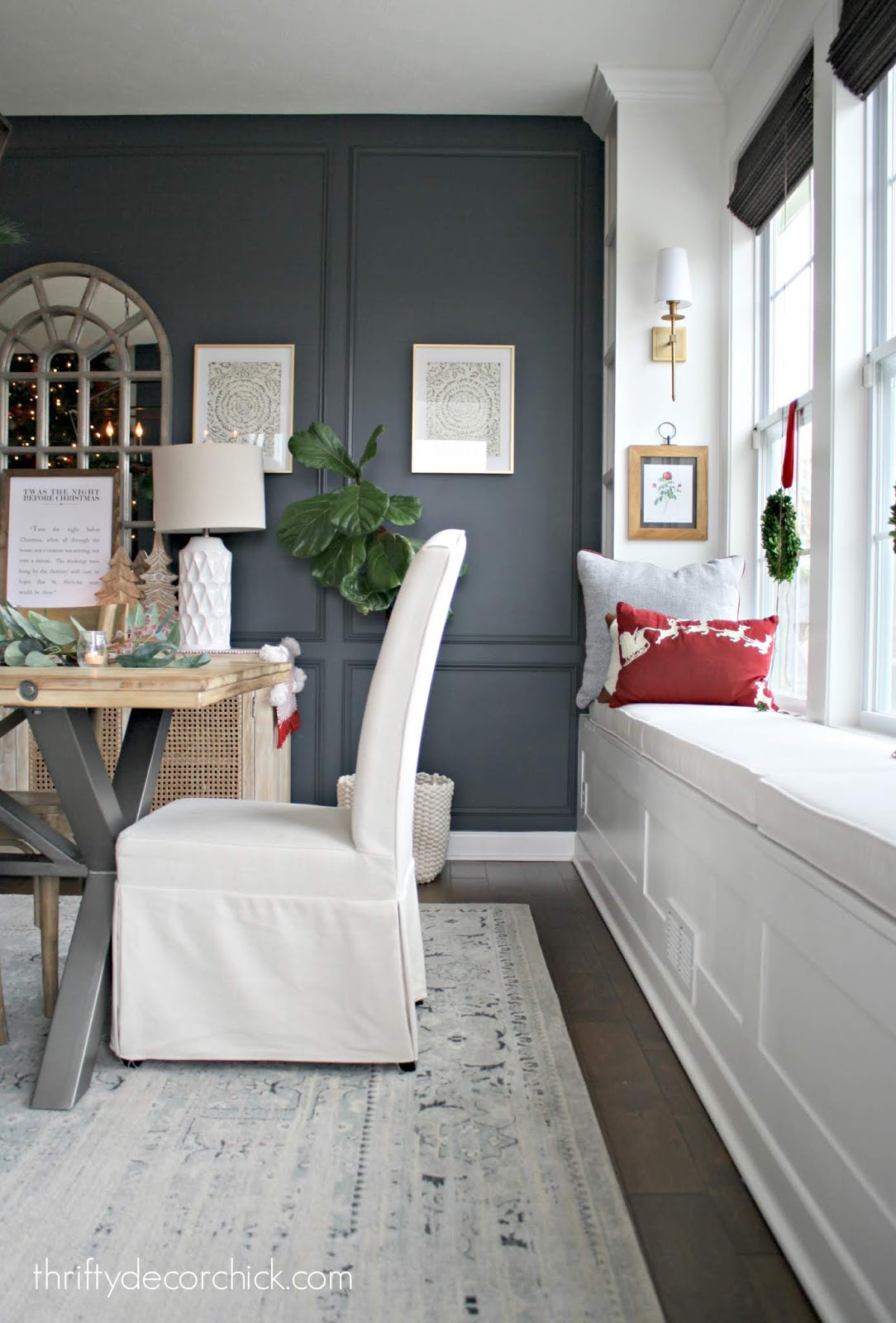 Long window seat with lights in dining area 