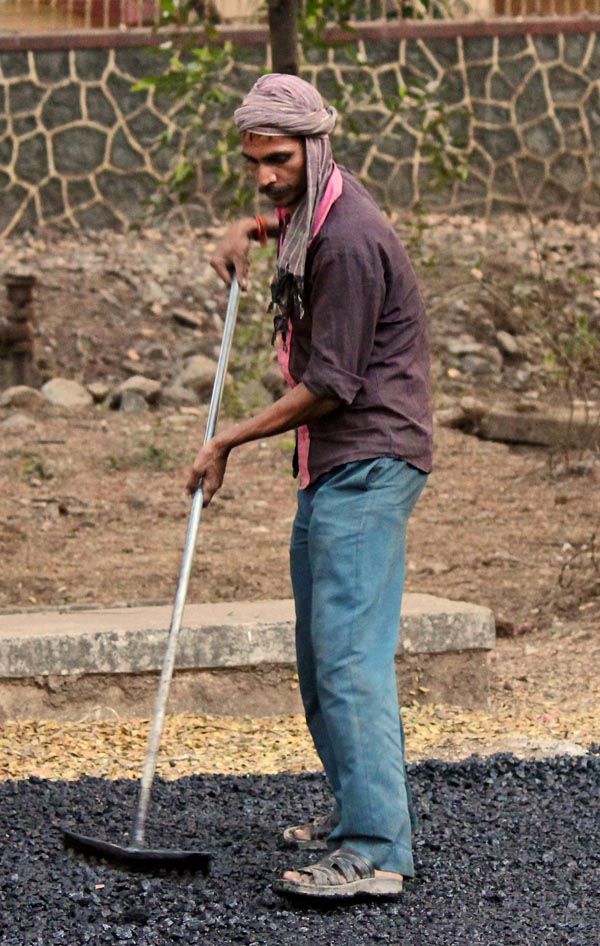 Stock Pictures Road being surfaced with tar