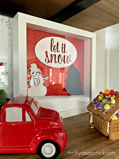 snow globe art with red glitter paper