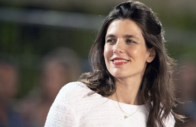 Charlotte Casiraghi of Monaco wore a white tweed top and tweed skirt from Cruise 2021 collection of Chanel