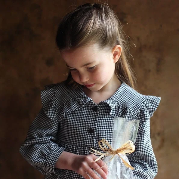 Princess Charlotte wore a houndstooth puritan collar dress by Zara. Happy birthday, Princess Charlotte. Kate Middleton