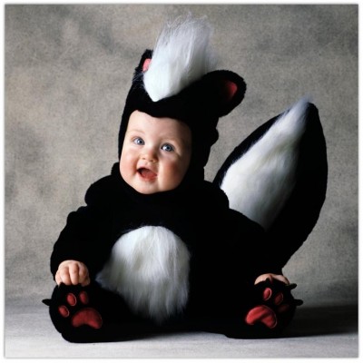 Baby in the costume a skunk