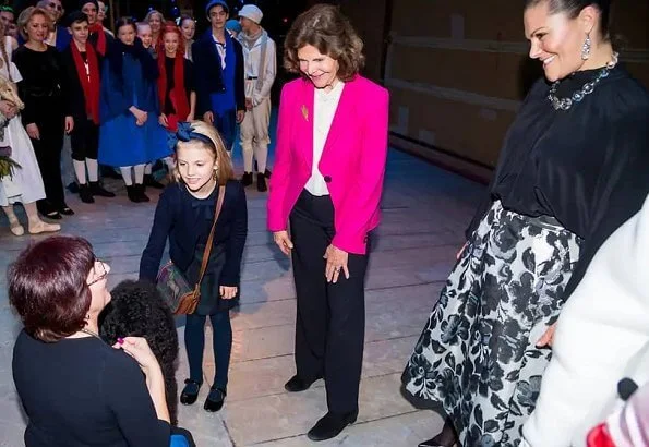 Crown Princess Victoria wore Baum Und Pferdgarten Sashenka metallic midi skirt. Princess Estelle and Queen Silvia
