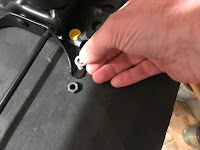 Attach the lock washers and nuts to the bolts