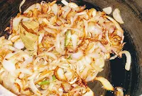 Sauteing onion for veg biryani recipe using pressure cooker