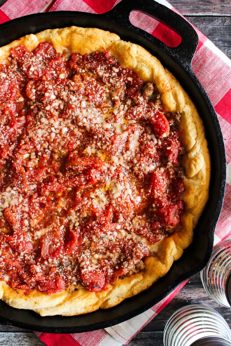This Crescent Roll Deep Dish Pizza is a fun twist on a classic Chicago-style pie. The crescent rolls make a delicious and easy shortcut crust for this tasty deep dish pizza! #pizza #crescentrolls