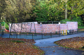 Fenced off play area after vandals set it on fire