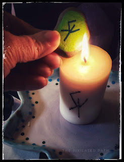 Step 8 - Pass Stone Through Candle Flame While Reciting Spell 