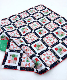 Glad Tidings Quilt Free Pattern designed by Suzanne of Splendid Speck