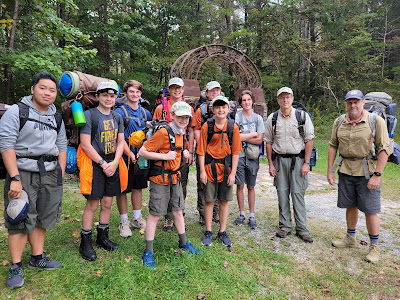 The troop gathered at the trailhead