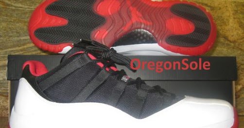 jordan 11 low white bred on feet