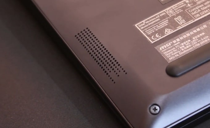 The down-firing speaker of MSI Modern 14 B4MW laptop.