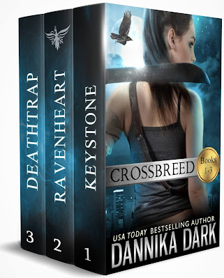 Boxed set with a tough woman on the cover holding a machette, a blue background with a silvery moon