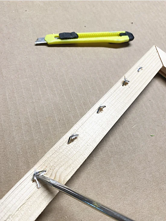 loosen staples with a screwdriver