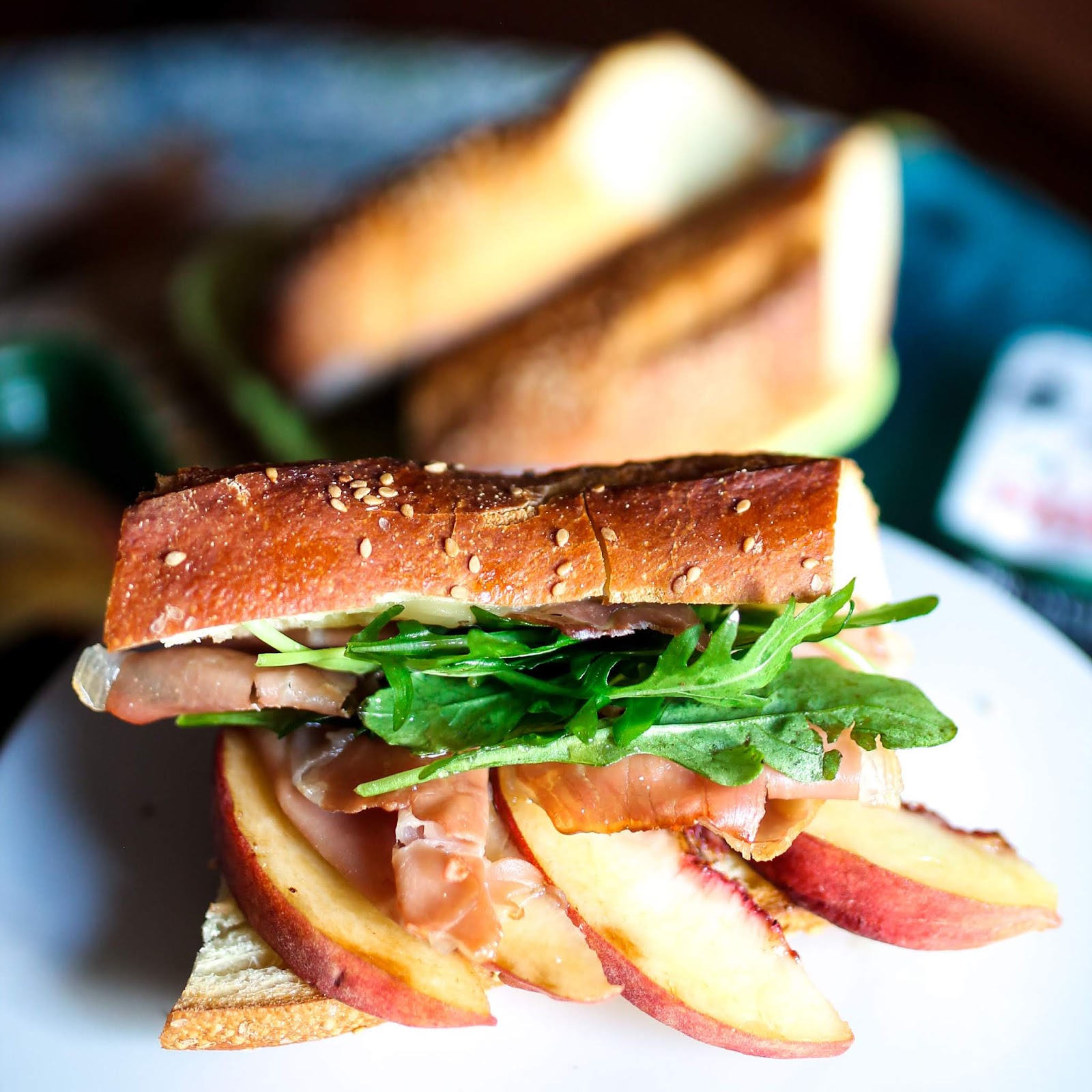 Easy Prosciutto and Brie Baguettes with Fresh Peaches and Honey Drizzle